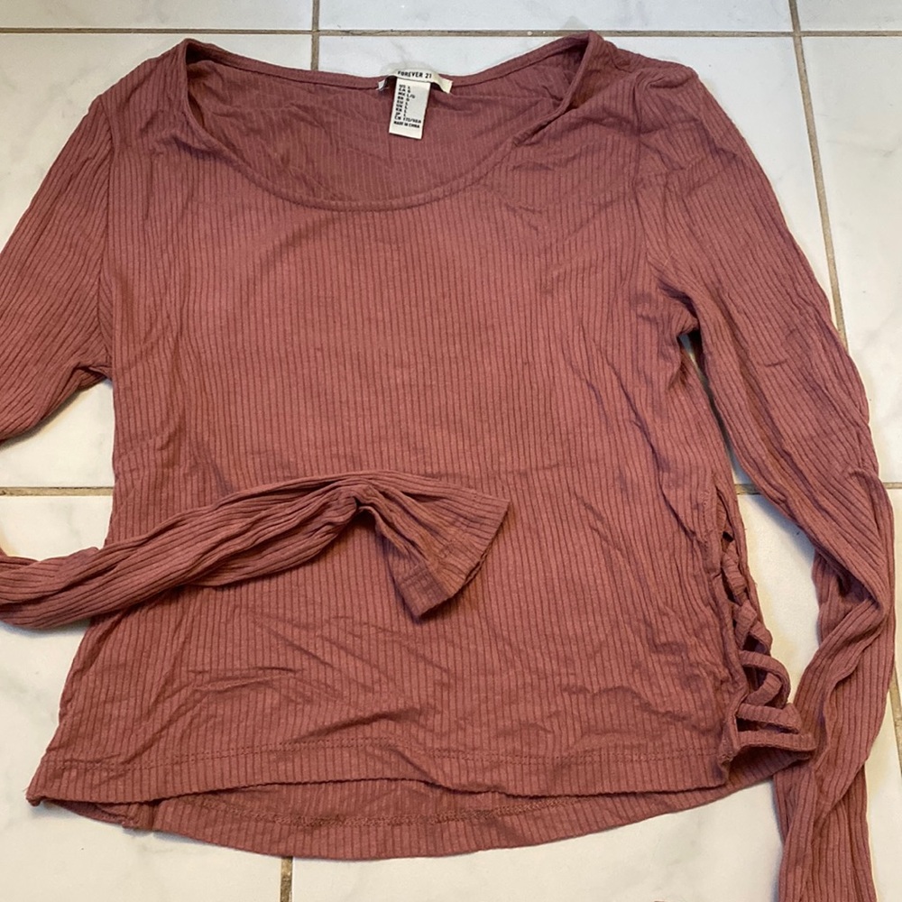 Forever 21 long sleeve crop top. Cut out on sides